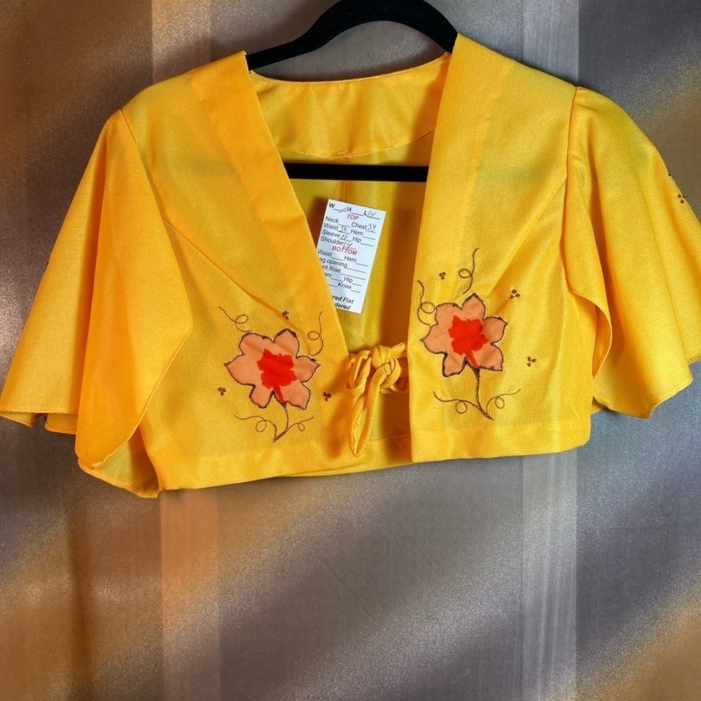 Vintage S 70’s shrug with butterfly sleeves. Hand embroidered front and sleeve